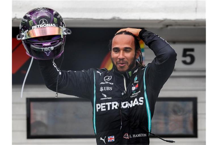Nahm mit Christina Aguilera einen Song auf: Formel-1-Weltmeister Lewis Hamilton. Foto: Leonhard Foeger/Pool Reuters/dpa