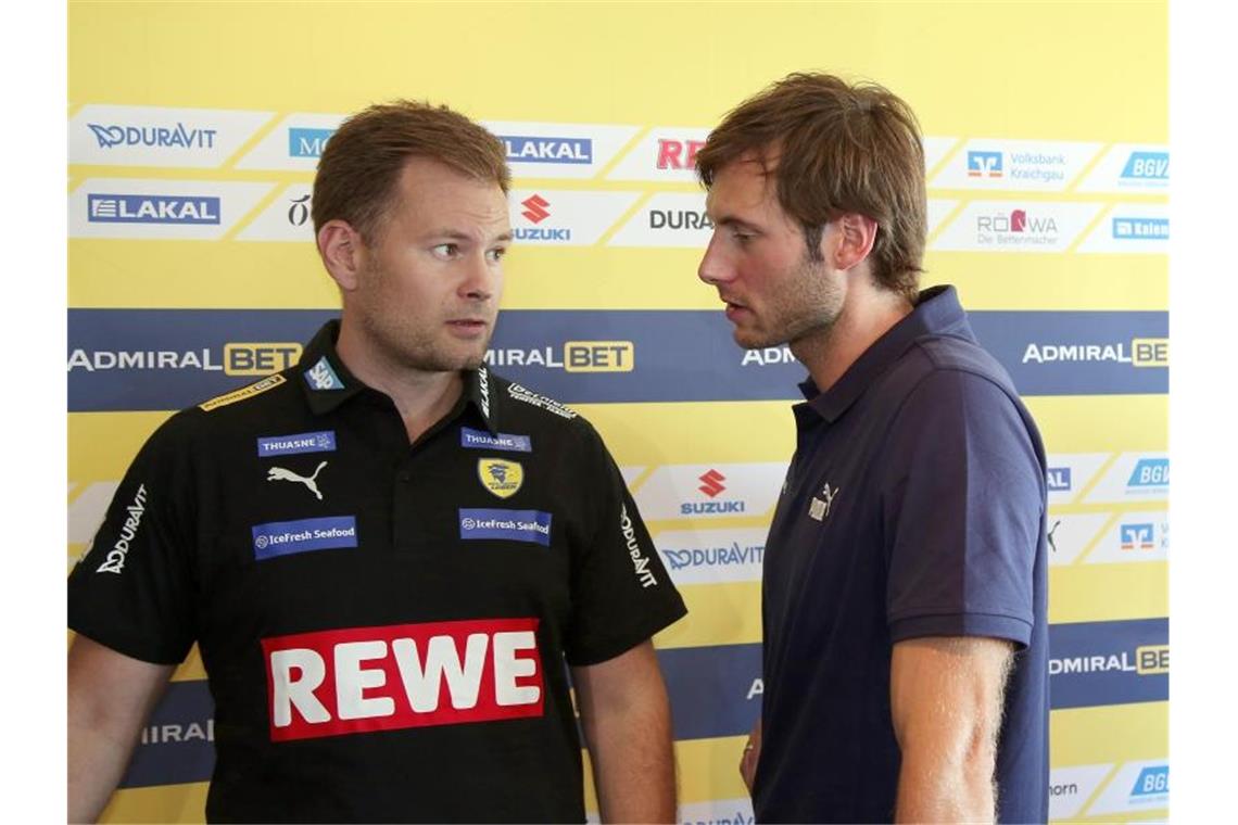 Gensheimer-Vorfreude „riesig“ - Rhein-Neckar Löwen demütig Neu bei den Rhein-Neckar Löwen: Trainer Kristjan Andresson (l) und Rückkehrer Uwe Gensheimer. Foto: Michael Deines