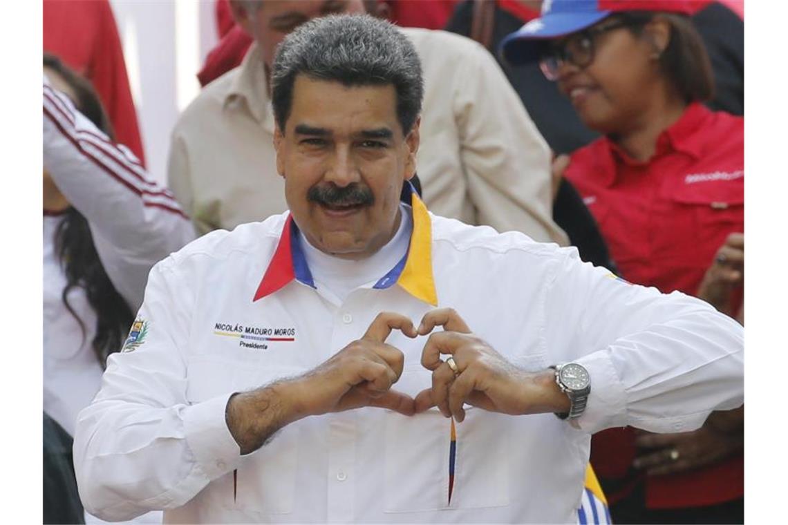 Venezuelas Regierung wird Foltermord vorgeworfen Nicolas Maduro, Präsident von Venezuela, während einer Kundgebung zum Jahrestag seiner Wiederwahl. Foto: Ariana Cubillos/AP/Archiv