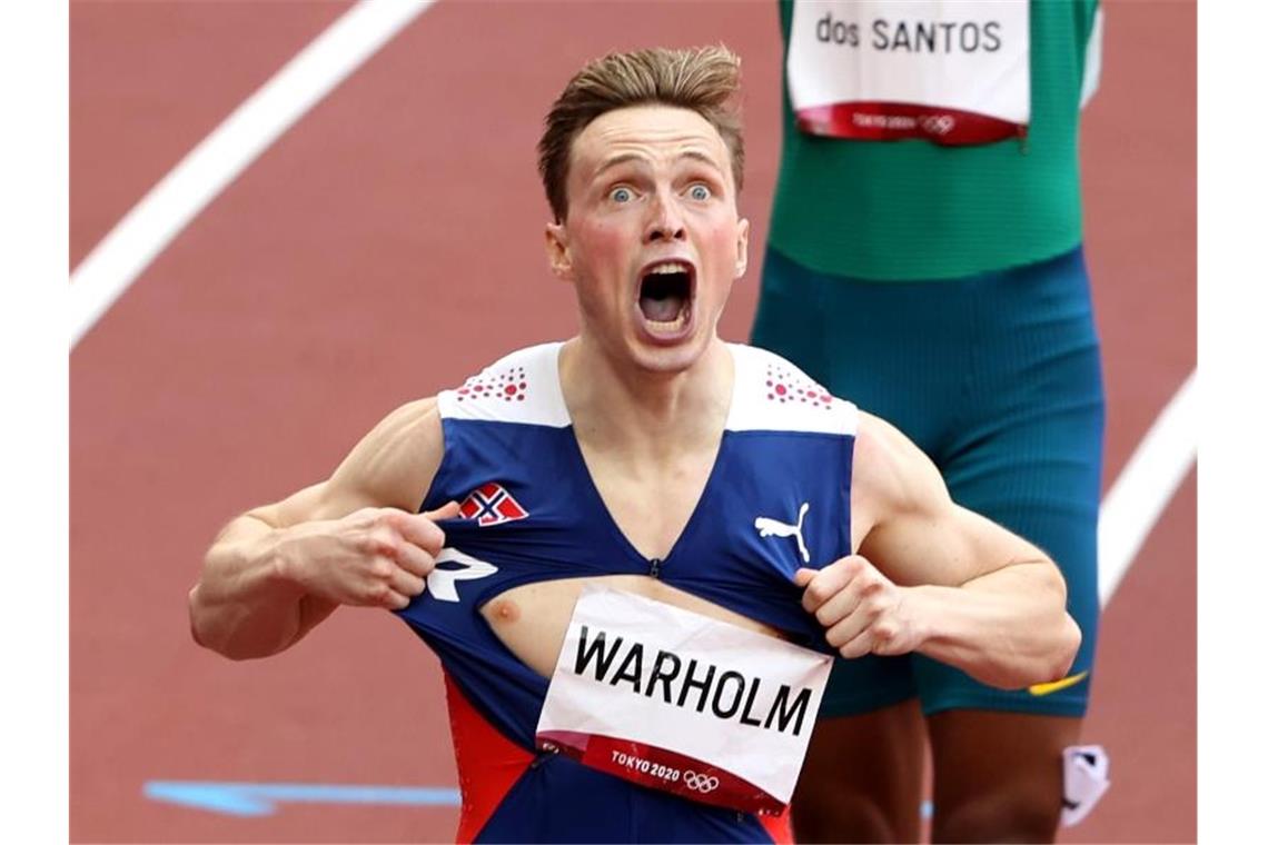 Norwegens Leichtathletik-Star Karsten Warholm rennt Weltrekord über die 400 Meter Hürden. Foto: Oliver Weiken/dpa