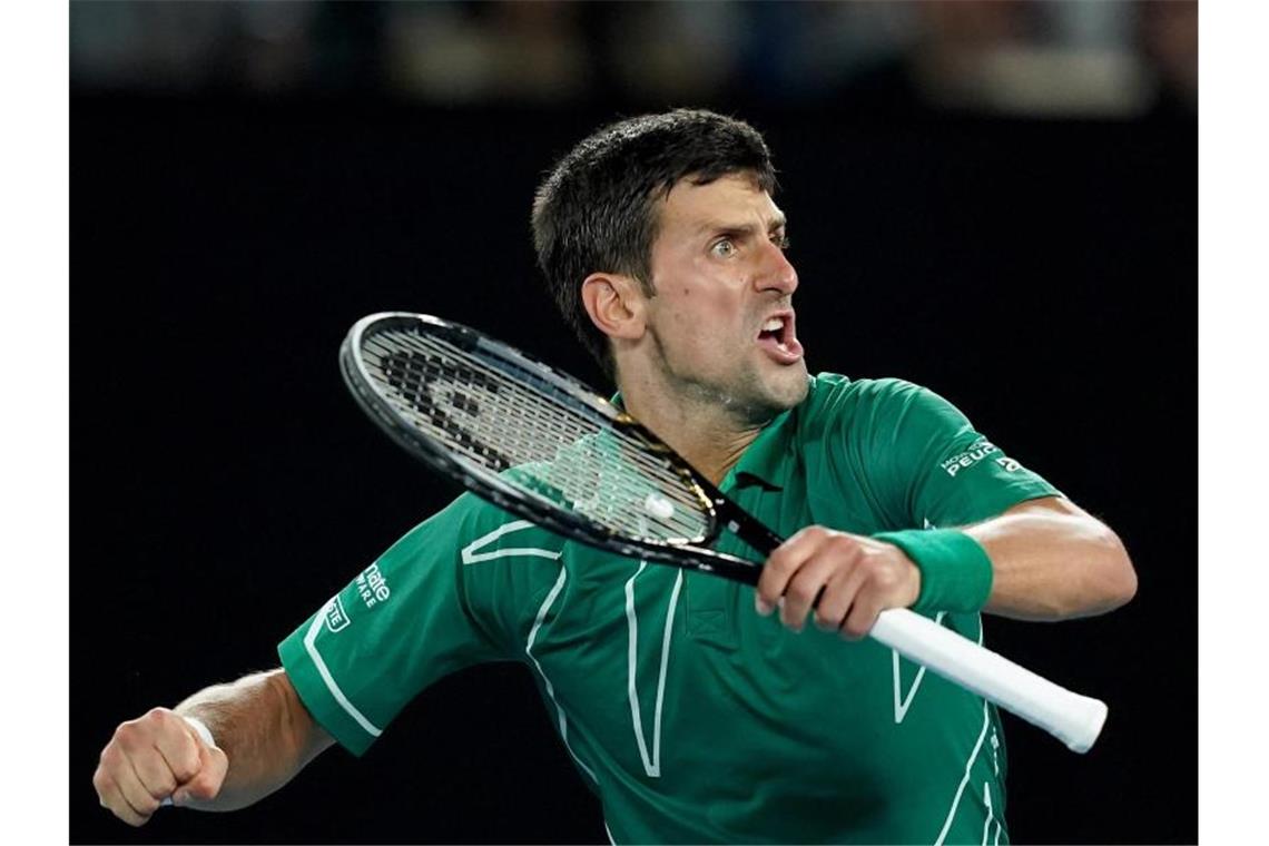 Djokovic dominiert Federer - Kenin & Muguruza im Damenfinale Novak Djokovic ballt nach seinem Sieg die Faust. Foto: Michael Dodge/AAP/dpa