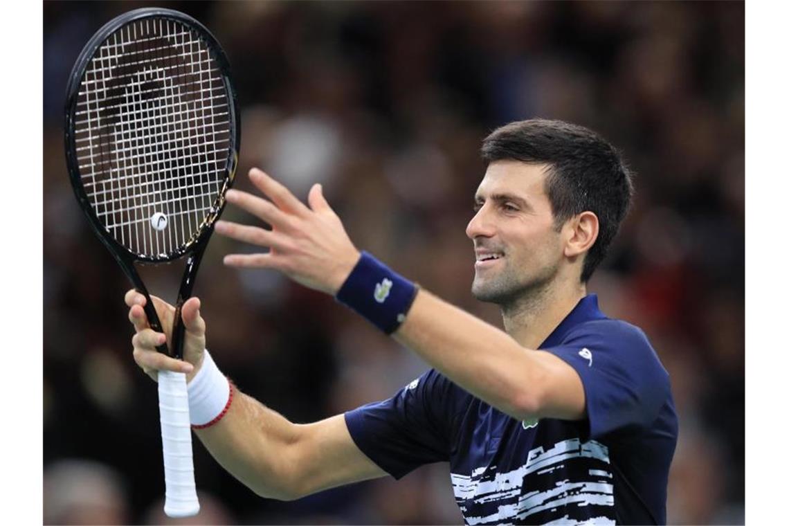 Federer verliert zum Auftakt - Djokovic souverän Novak Djokovic gewann gegen Turnier-Debütanten Matteo Berrettini mit 6:2, 6:1. Foto: Michel Euler/AP/dpa