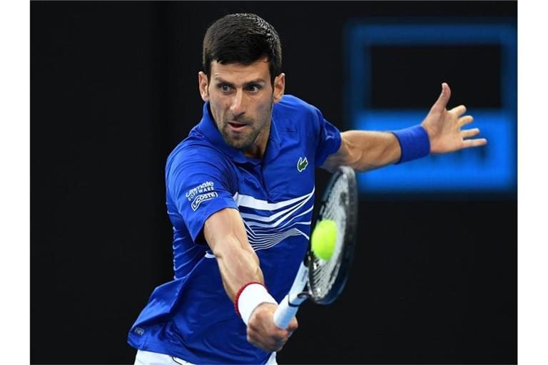 Novak Djokovic profitierte von der Aufgabe von Kei Nishikori. Foto: Lukas Coch/AAP