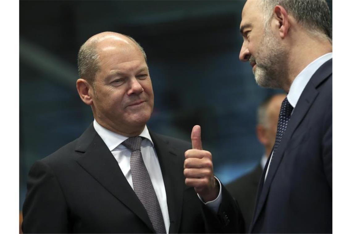G20-Mächte machen Druck bei Besteuerung von Digitalriesen Olaf Scholz, Bundesfinanzminister, spricht während des Treffens der Euro-Finanzminister mit Pierre Moscovici, EU-Wirtschaftskommissar. Foto: Francisco Seco/AP