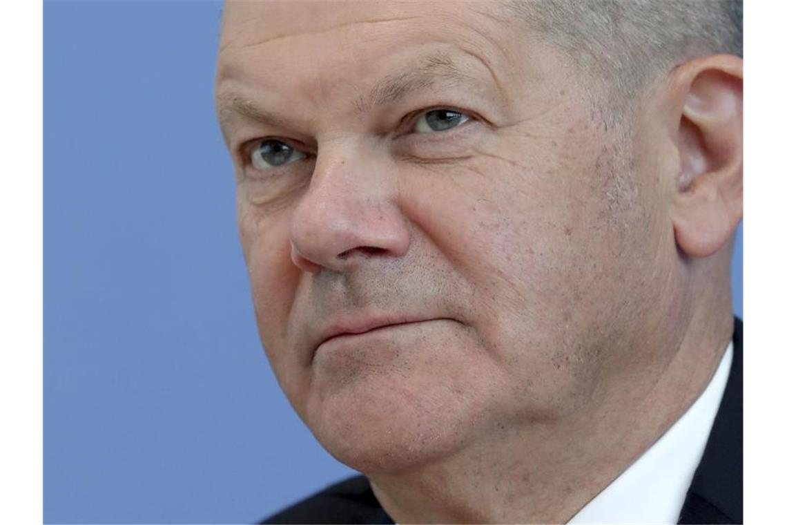 Olaf Scholz plant Milliarden-Schutzschirm für die Kommunen Olaf Scholz ist im Kabinett Merkel für die Finanzen zuständig. Foto: Michael Sohn/POOL AP/dpa