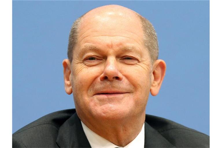 Olaf Scholz (SPD), möglicher neuer Bundeskanzler, sieht die Ampel-Verhandlungen auf Kurs. Foto: Wolfgang Kumm/dpa