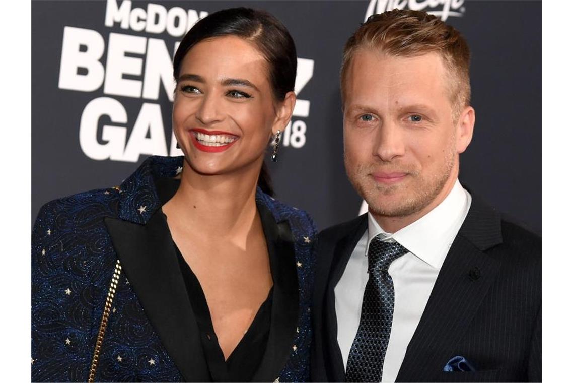 Einbruch bei den Pochers - während die beiden zuhause sind Oliver und Amira Pocher bei einer Benefizgala 2018 in München. Foto: Tobias Hase/dpa