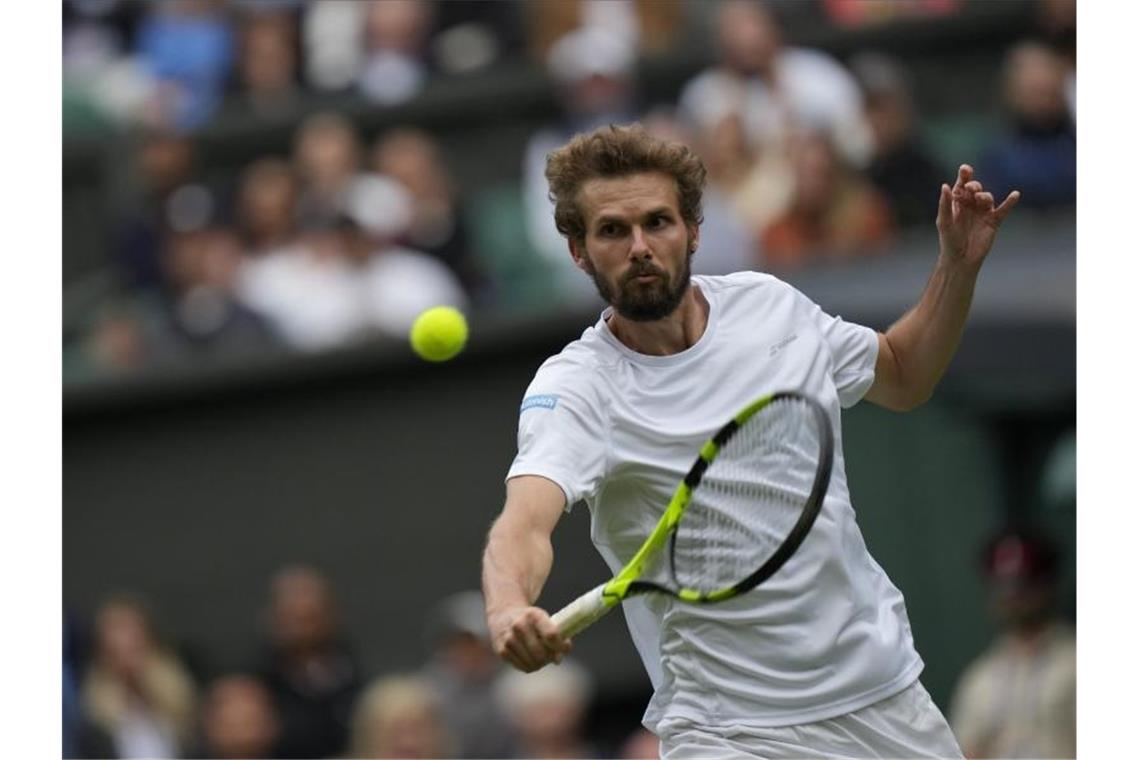 Otte nach Wimbledon-Erfahrung gegen Murray: Es war irreal Oscar Otte beim Spiel gegen Andy Murray in Aktion. Foto: Alastair Grant/AP/dpa