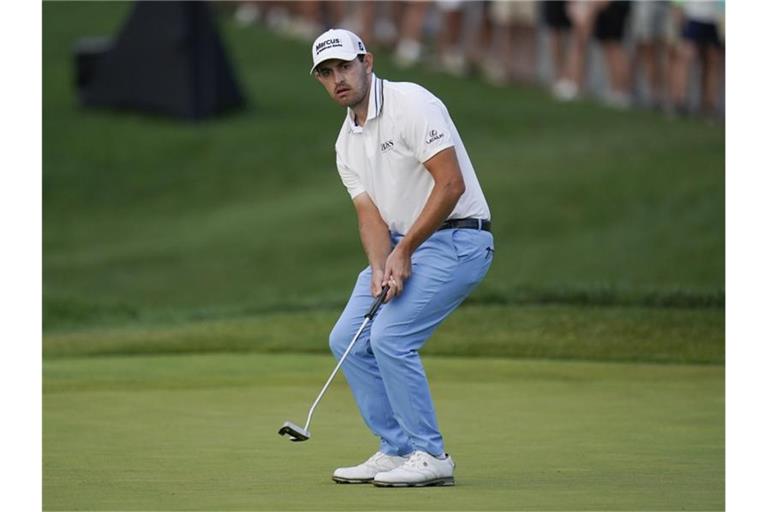 Patrick Cantlay aus den USA geht als Führender ins Saisonfinale. Foto: Julio Cortez/AP/dpa