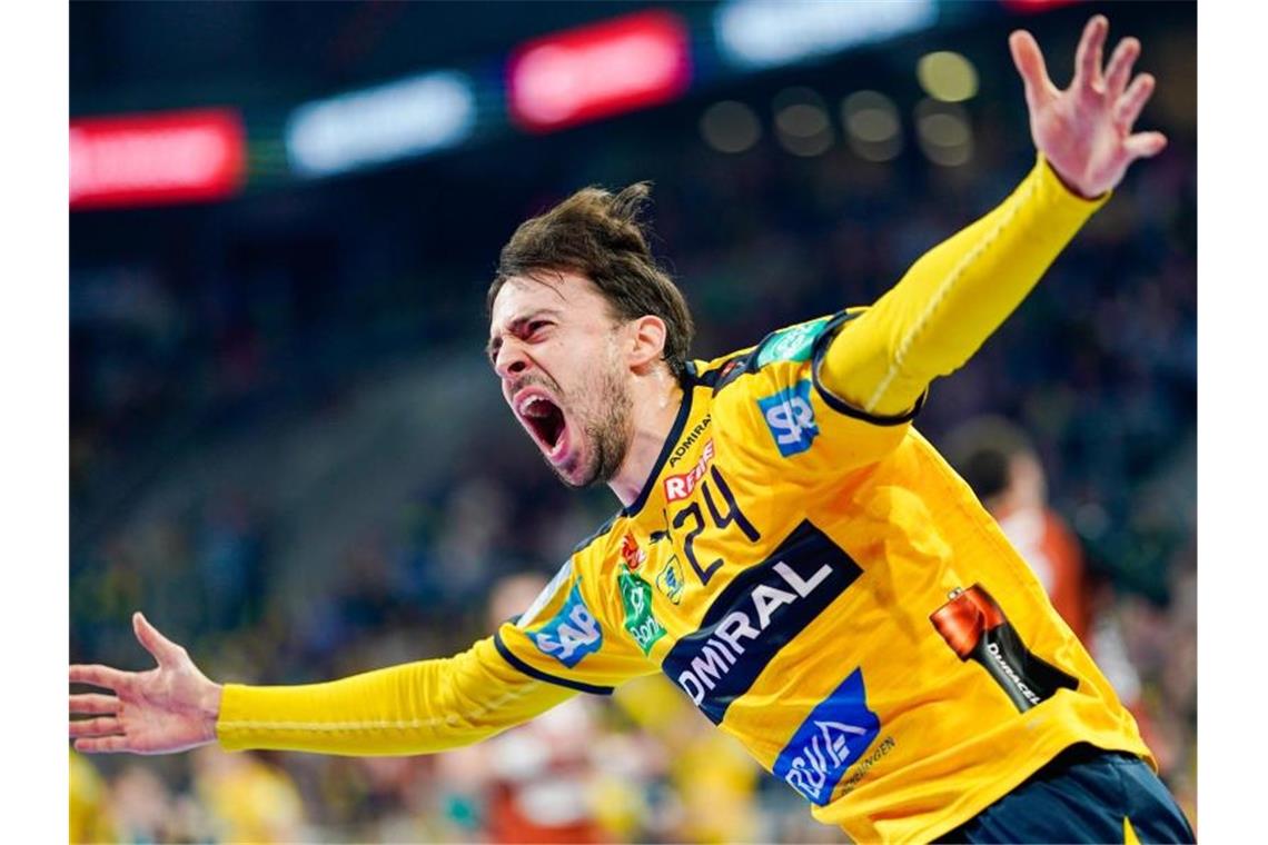 Nationalspieler Groetzki bis 2023 bei Rhein-Neckar Löwen Patrick Groetzki von den Rhein-Neckar Löwen jubelt über ein Tor. Foto: Uwe Anspach/dpa/Archivbild