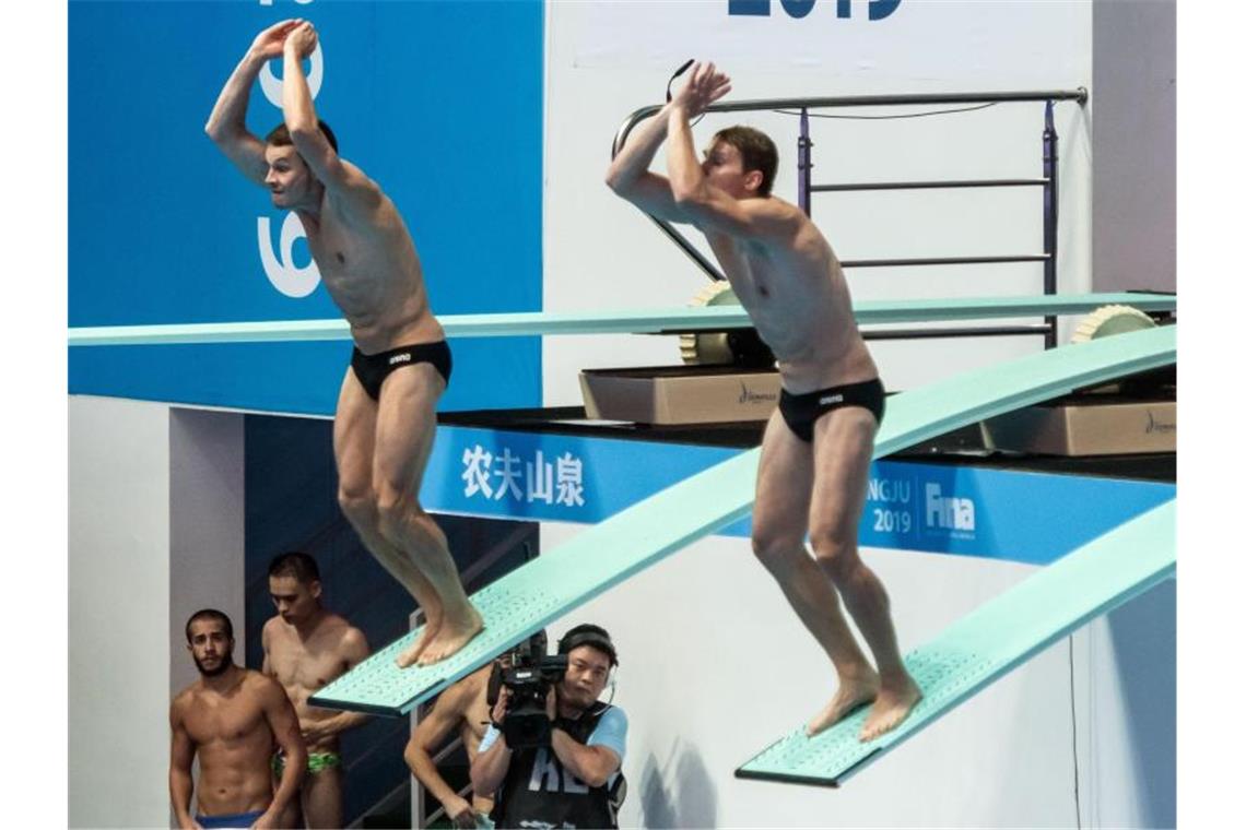 Vierter Platz: Hausding/Rüdiger meistern WM-Premiere Patrick Hausding (l) und Lars Rüdiger verpassten eine WM-Medaille vom Drei-Meter-Brett. Foto: Bernd Thissen