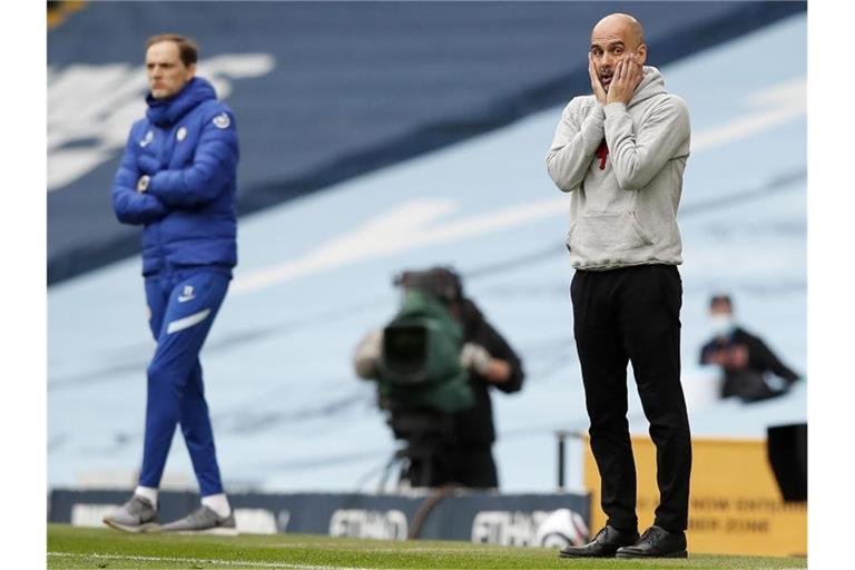 Pep Guardiola (r) verlor mit Man City gegen den FC Chelseas und Thomas Tuchel. Foto: Martin Rickett/Pool PA/AP/dpa