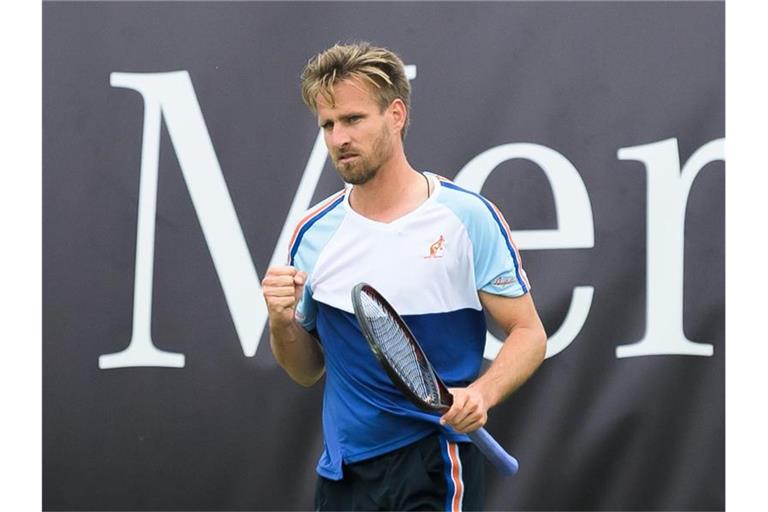 Peter Gojowczyk ballt nach einem Ballwechsel im Match gegen Gilles Simon die Faust. Foto: Silas Stein