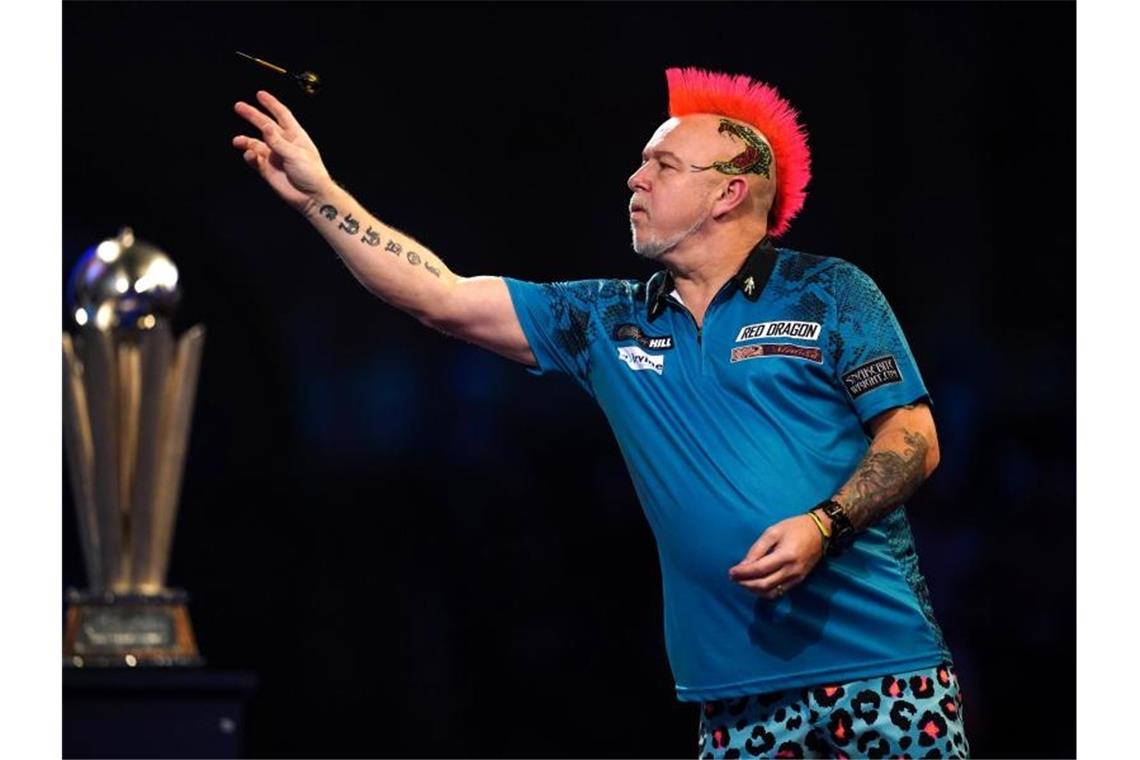 Peter Wright setzte sich im Finale gegen Michael Smith mit 7:5 durch. Foto: John Walton/PA Wire/dpa