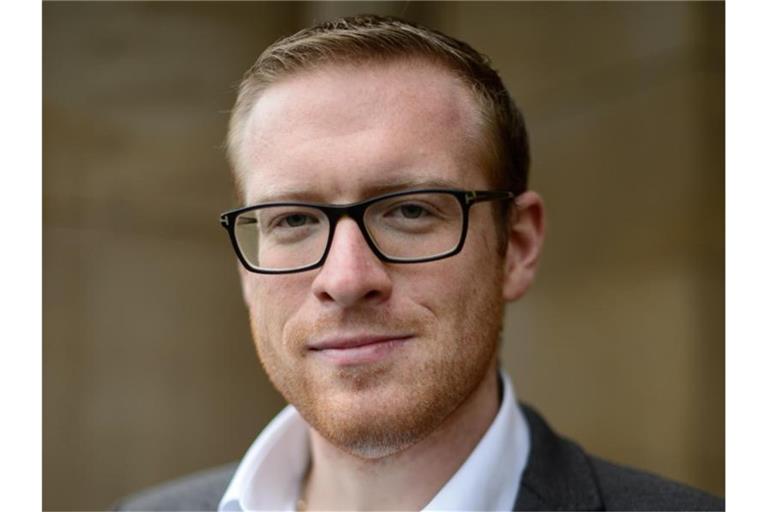 Philipp Bürkle posiert für ein Foto. Foto: Sina Schuldt/dpa/Archivbild