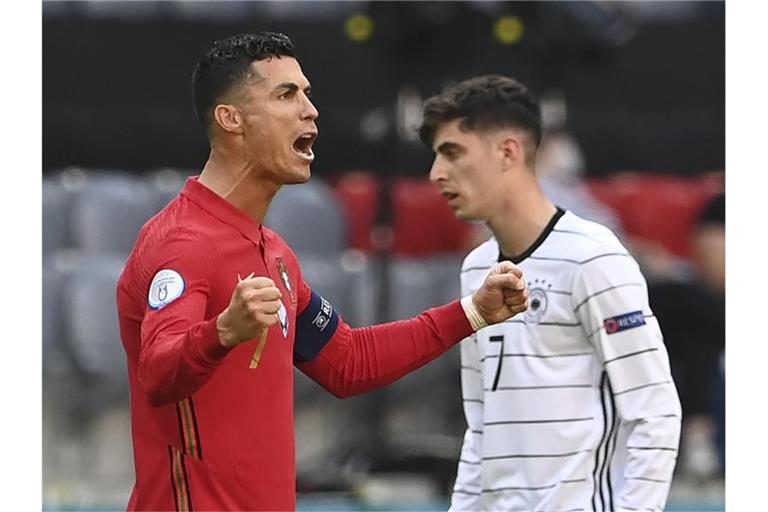 Portugals Cristiano Ronaldo bejubelt sein Tor zum zwischenzeitlichen 1:0 gegen Deutschland. Foto: Christof Stache/Pool AFP/dpa
