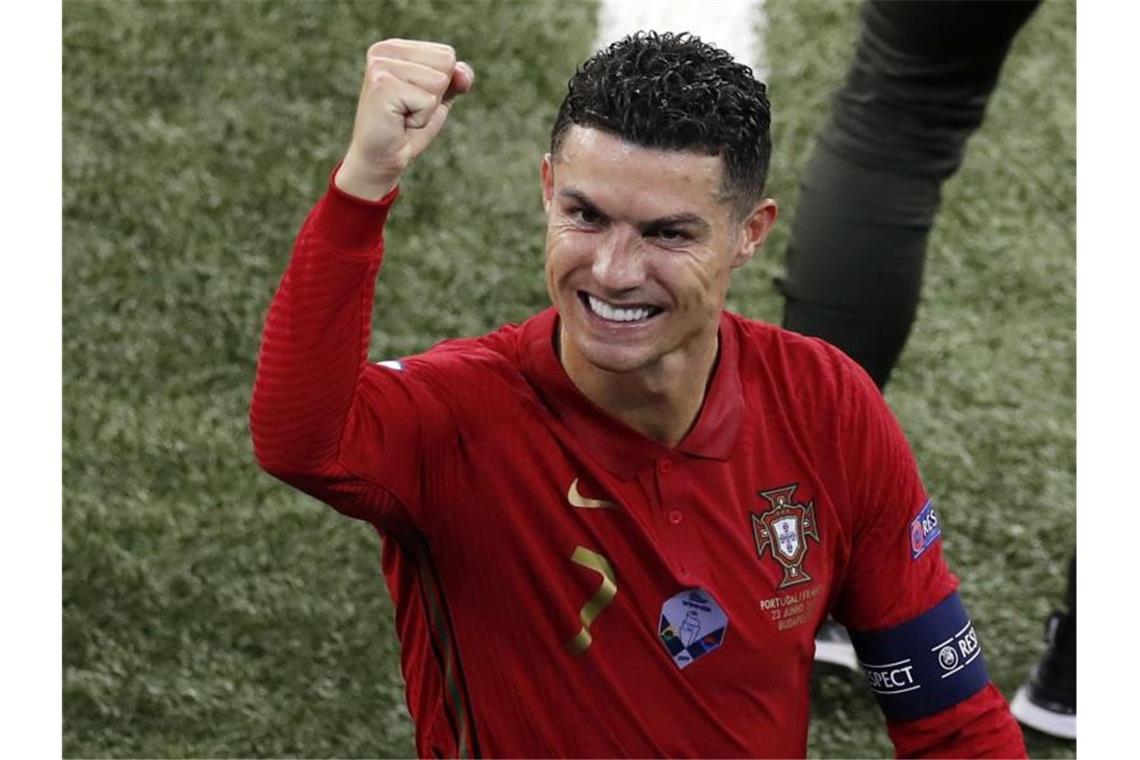 Portugals Cristiano Ronaldo jubelt nach dem Spiel gegen Frankreich. Foto: Laszlo Balogh/POOL AP/dpa