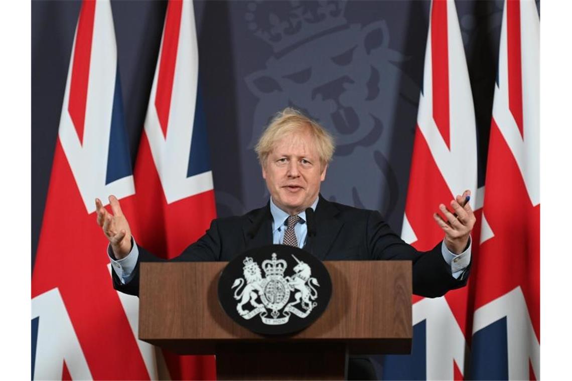 Britisches Unterhaus stimmt Brexit-Handelspakt zu Premierminister Boris Johnson spricht nach dem Durchbruch in den Brexit-Verhandlungen am 24. Dezember bei einer Pressekonferenz in der Downing Street. Foto: Paul Grover/Daily Telegraph/PA Wire/dpa