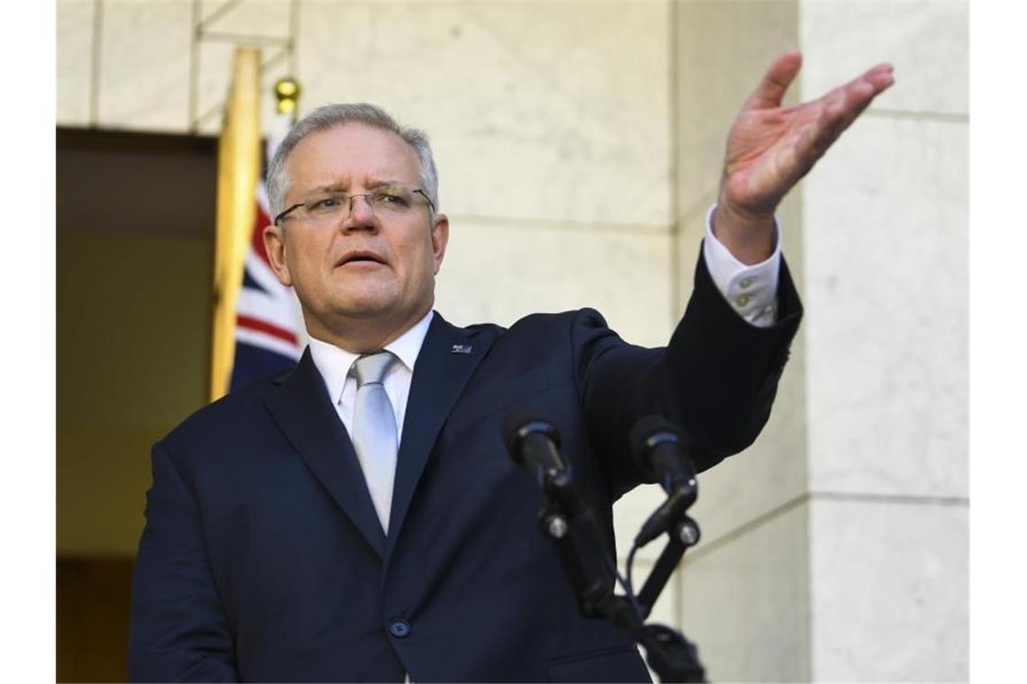 Premierminister von Australien Scott Morrison untersagt seinen Bürgern bis auf Weiteres jegliche Reisen ins Ausland. Foto: Lukas Coch/AAP/dpa
