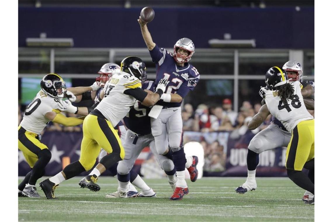 Quarterback Tom Brady (M.) führte die New England Patriots zum Sieg. Foto: Steven Senne/AP