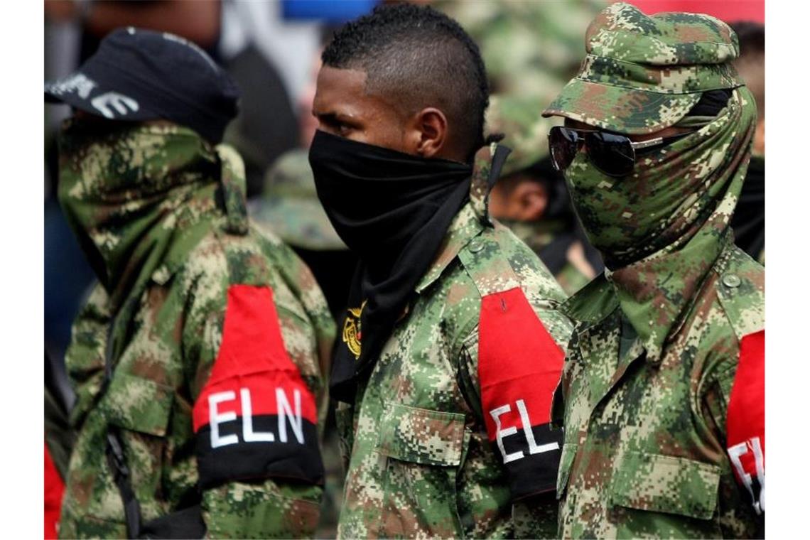 Rebellen der kolumbianischen Guerillagruppe ELN. Foto: Christian Escobar Mora/EFE/dpa/Archiv