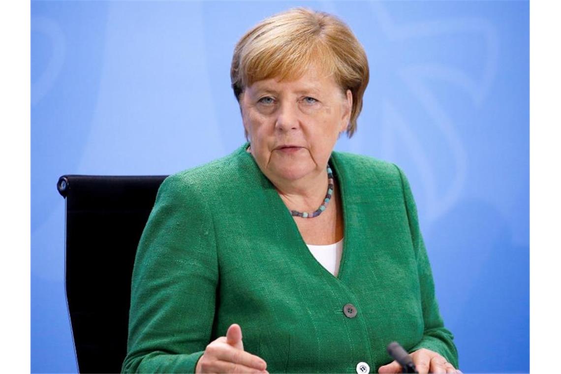 Merkel stimmt Bürger auf schwierige Corona-Zeiten ein Rede und Antwort steht Kanzlerin Angela Merkel (CDU) heute bei ihrer traditionellen Sommerpressekonferenz. Foto: Michele Tantussi/Reuters/Pool/dpa