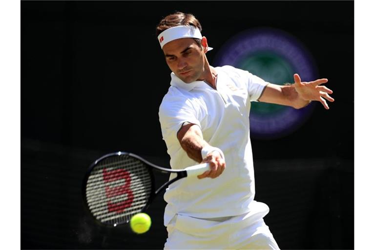 Roger Federer spielt im Achtelfinale gegen Matteo Berrettini. Foto: Mike Egerton/PA Wire