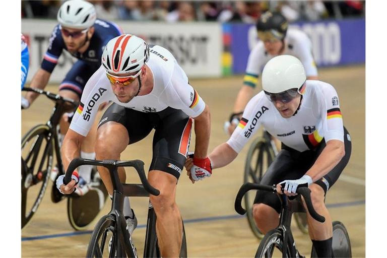 Roger Kluge (l) und Theo Reinhardt (r) streben ihren dritten WM-Sieg in Serie an. Foto: Piotr Nowak/PAP/dpa
