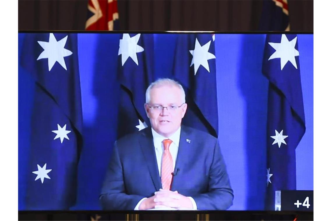 Scott Morrison, Premierminister von Australien, spricht während einer virtuellen Pressekonferenz im Parlamentsgebäude zu den Medien. Foto: Lukas Coch/AAP/dpa
