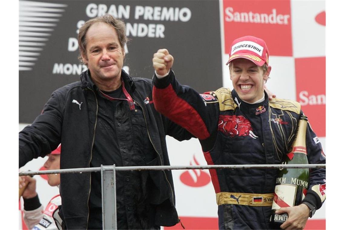 Vettels neue Mission - Aufbauhelfer und Erfolgsbeschleuniger Sebastian Vettel (r) freut sich 2008 mit dem damaligen Torro Rosso-Mitbesitzer Gerhard Berger über seinen ersten F1-Sieg in Monza. Foto: Felix Heyder/dpa