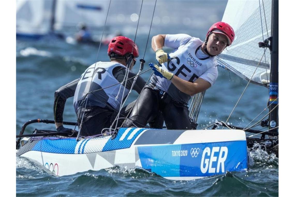 Segelte in Japan zu Olympia-Bronze: Alicia Stuhlemmer und Paul Kohlhoff. Foto: Bernat Armangue/AP/dpa