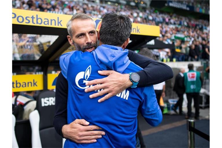 Sehen sich beim Rückrunden-Auftakt wieder: Schalke-Coach David Wagner (vorne) und Gladbachs Marco Rose. Foto: Marius Becker/dpa