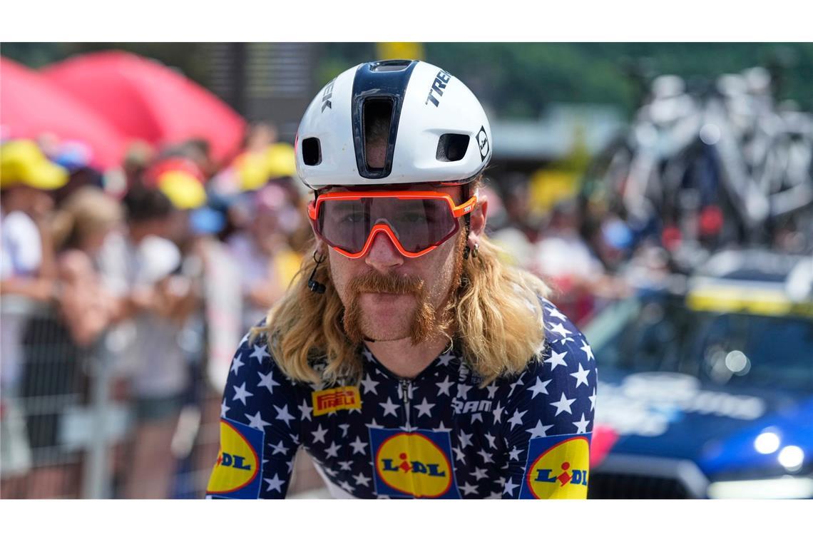Bilder des Tages Sein Spitzname ist "Captain America": Der US-Amerikaner Quinn Simmons steht am Start bei der neunzehnten Etappe der Tour de France.