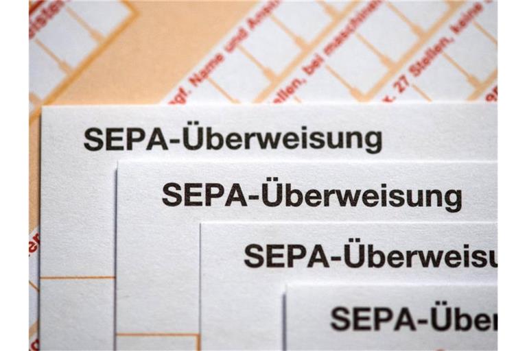 Seit November 2017 kann in Europa Geld binnen Sekunden überwiesen werden - doch in Deutschland nutzen die wenigsten Bankkunden solche Echtzeitzahlungen. Foto: Fabian Sommer/dpa