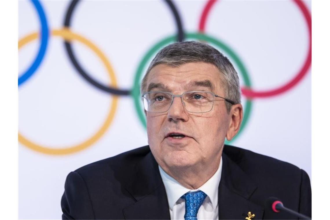 Sieht Impfungen als „Schlüssel für den Erfolg“ für die Tokio-Spiele: IOC-Präsident Thomas Bach. Foto: Jean-Christophe Bott/KEYSTONE/dpa