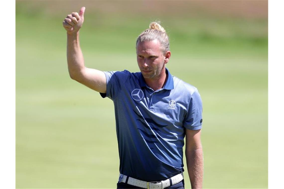 British Open: Schmid und Siem schaffen den Cut Siem überzeugte auf dem Links-Kurs im englischen Küstenort Sandwich wie am Vortag mit einer 67er-Runde. Foto: Richard Sellers/PA Wire/dpa