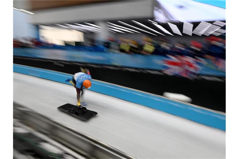 Skeleton-Weltmeister Christopher Grotheer aus Deutschland in Aktion bei den Olympischen Winterspielen in Peking. Foto: Robert Michael/dpa-Zentralbild/dpa