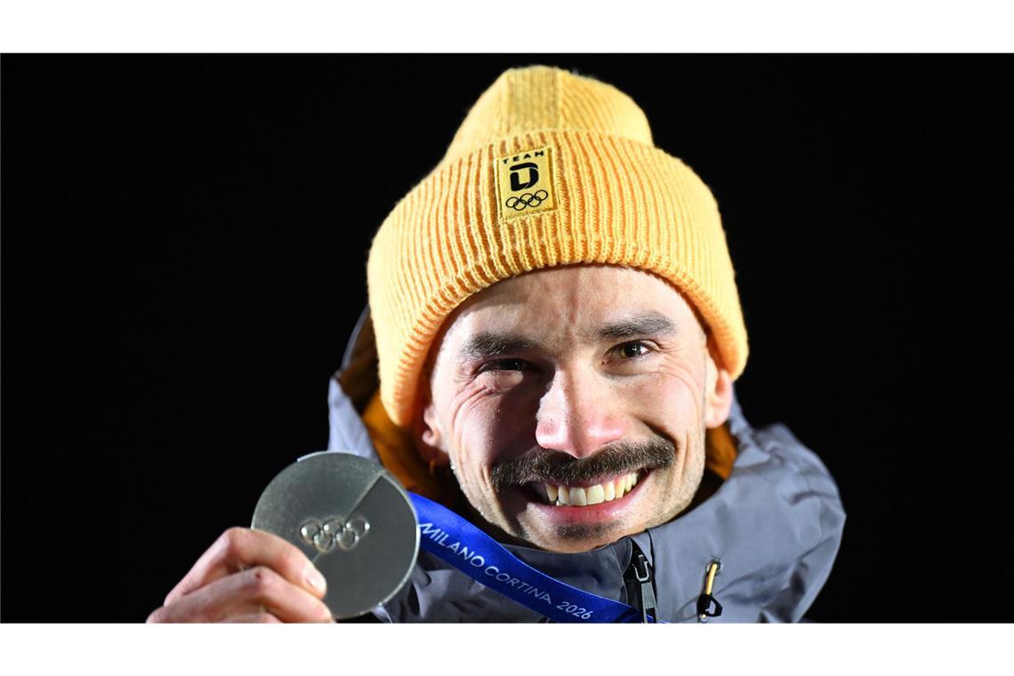 Skeletoni Axel Jungk raste kopfüber zu Silber im Eiskanal von Cortina.