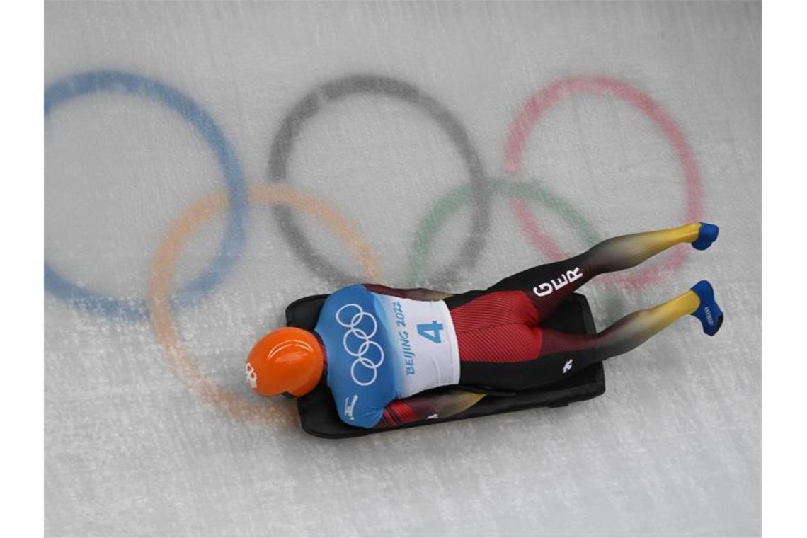 Das war die Olympia-Nacht Skeletoni Christopher Grotheer liegt auf Gold-Kurs. Foto: Robert Michael/dpa