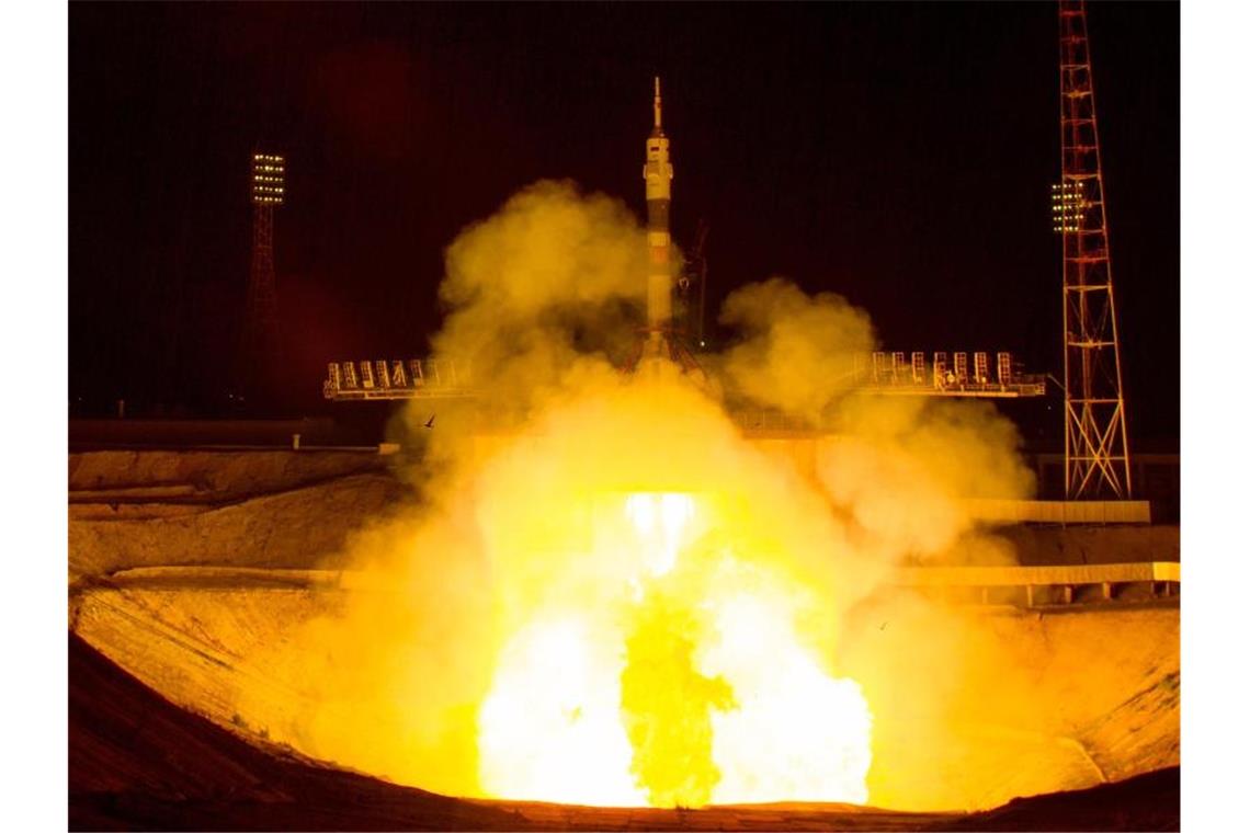 US-Vize Pence würdigt Mondlandung - ISS-Mission zum Jubiläum Sojus-Raketenstart im kasachischen Weltraumbahnhof Baikonur - an Bord: der italienische Esa-Astronaut Luca Parmitano, der Amerikaner Andrew Morgan und der russische Kosmonaut Alexander Skworzow. Foto: Joel Kowsky/NASA/AP