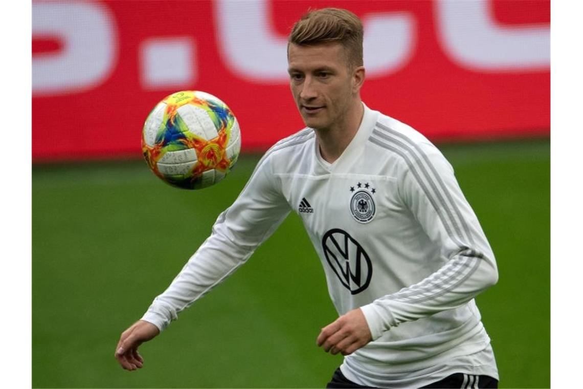 Löw setzt in Estland auf Reus - Stark und Güdogan fraglich Soll gegen Estland wieder im DFB-Trikot auflaufen: Marco Reus. Foto: Federico Gambarini/dpa