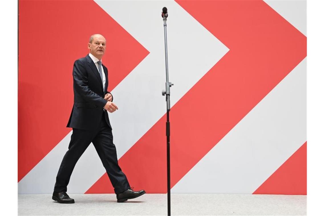 SPD-Fraktion tagt: Schnelle Regierungsbildung SPD-Kanzlerkandidat Olaf Scholz: „Machen uns gemeinsam an die Arbeit.“. Foto: Britta Pedersen/dpa