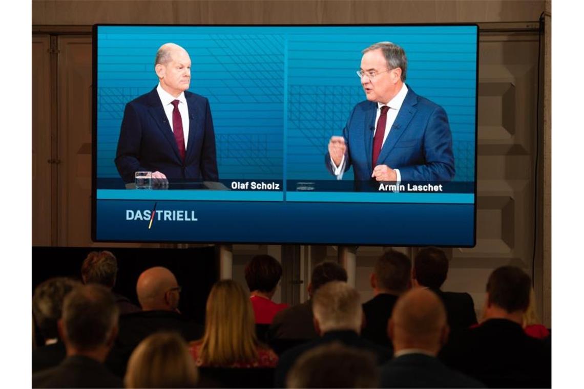 Geldwäsche, Wirecard: Worüber Scholz und Laschet stritten SPD-Kanzlerkandidat Olaf Scholz wurde von Union-Kanzlerkandidat Armin Laschet attackiert. Foto: Christophe Gateau/dpa