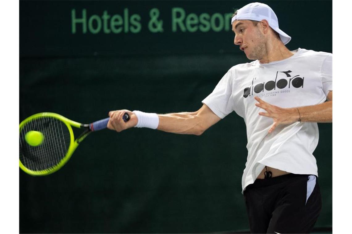 Deutsche Tennis-Herren wollen wieder nach Madrid Spielt das erste Einzel in der Davis-Cup-Partie gegen Weißrussland: Jan-Lennard Struff. Foto: Federico Gambarini/dpa