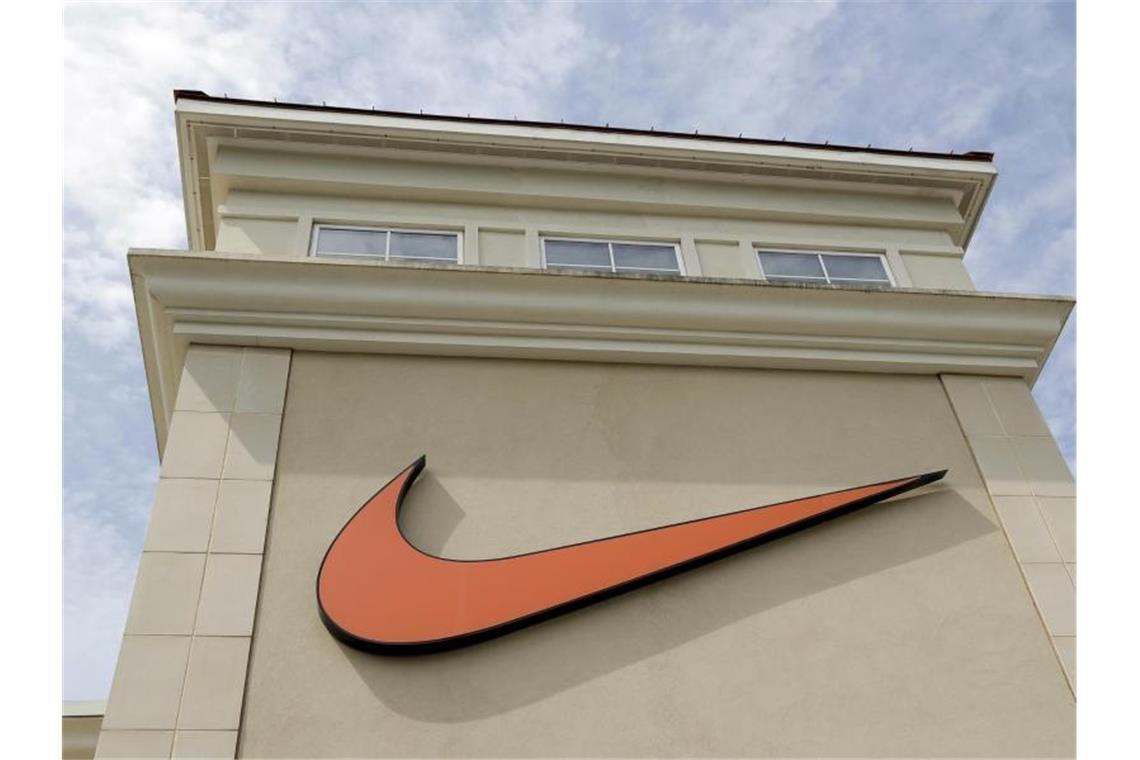 Sportartikelhersteller Nike verzeichnet hohe Verluste. Foto: Chuck Burton/AP/dpa