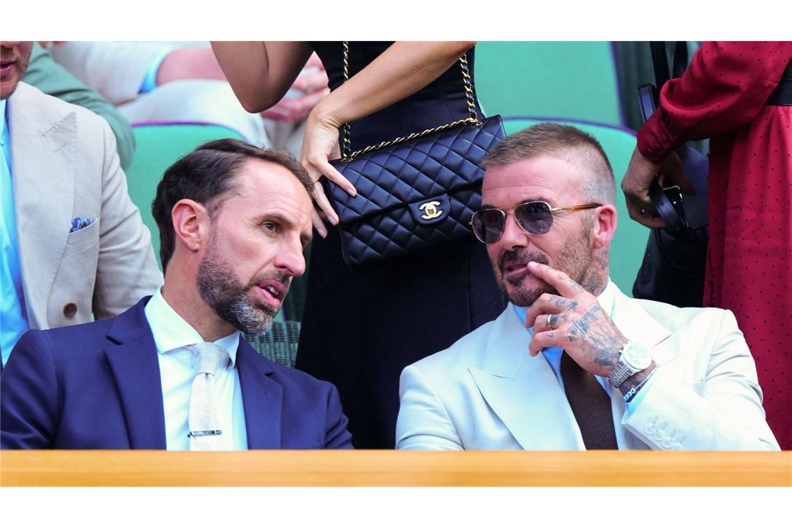 In der „Royal Box“ ist die Celebrity-Dichte schon hoch Sprachen sie vielleicht eher über Fußball? Englands früherer Nationaltrainer Gareth Southgate (links) und Sir David Beckham, wie er sich jetzt nennen darf.