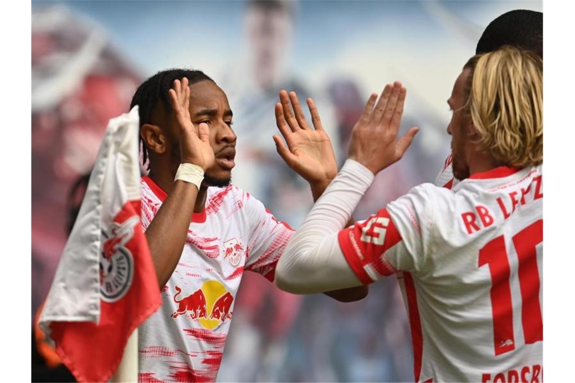 Stehen mit Leipzig in Brügge unter Druck: Christopher Nkunku (l) und Emil Forsberg. Foto: Robert Michael/dpa-Zentralbild/dpa