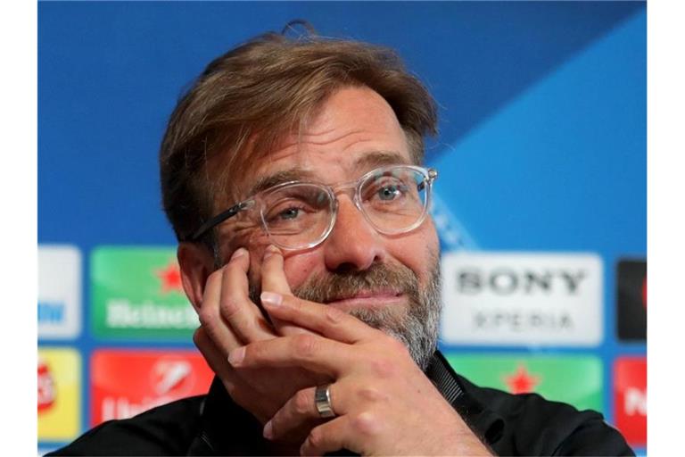 Steht mit dem FC Liverpool kurz vor seinem größten Triumph in England und kann schon mal träumen: Jürgen Klopp. Foto: Richard Sellers/PA Wire/dpa