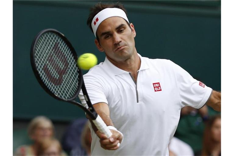 Steht zum 17. Mal im Viertelfinale des Rasenturniers in London: Roger Federer. Foto: Alastair Grant/AP