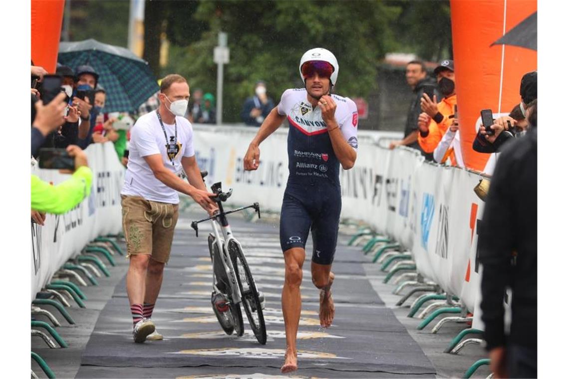 Frodeno stürmt im Dauerregen zur Triathlon-Weltbestzeit Stellte im Allgäu eine neue Bestzeit auf: Jan Frodeno. Foto: Karl-Josef Hildenbrand/dpa